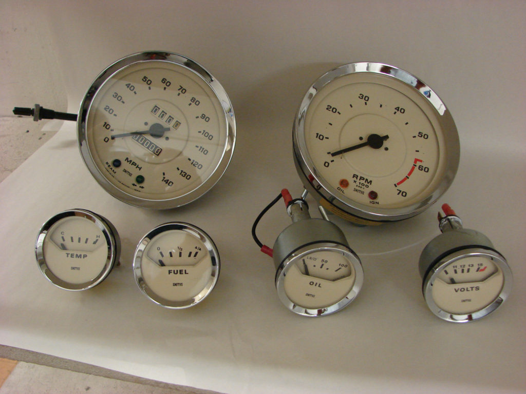 Two large speedometers and four smaller instruments