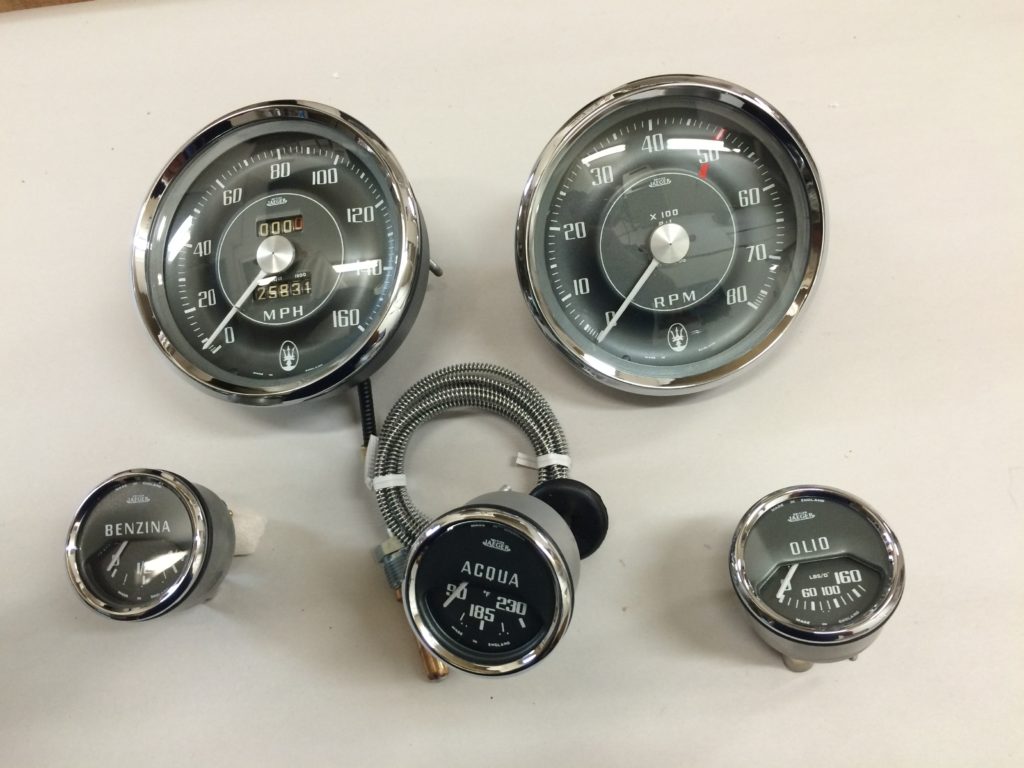 Two large speedometers and three smaller instruments