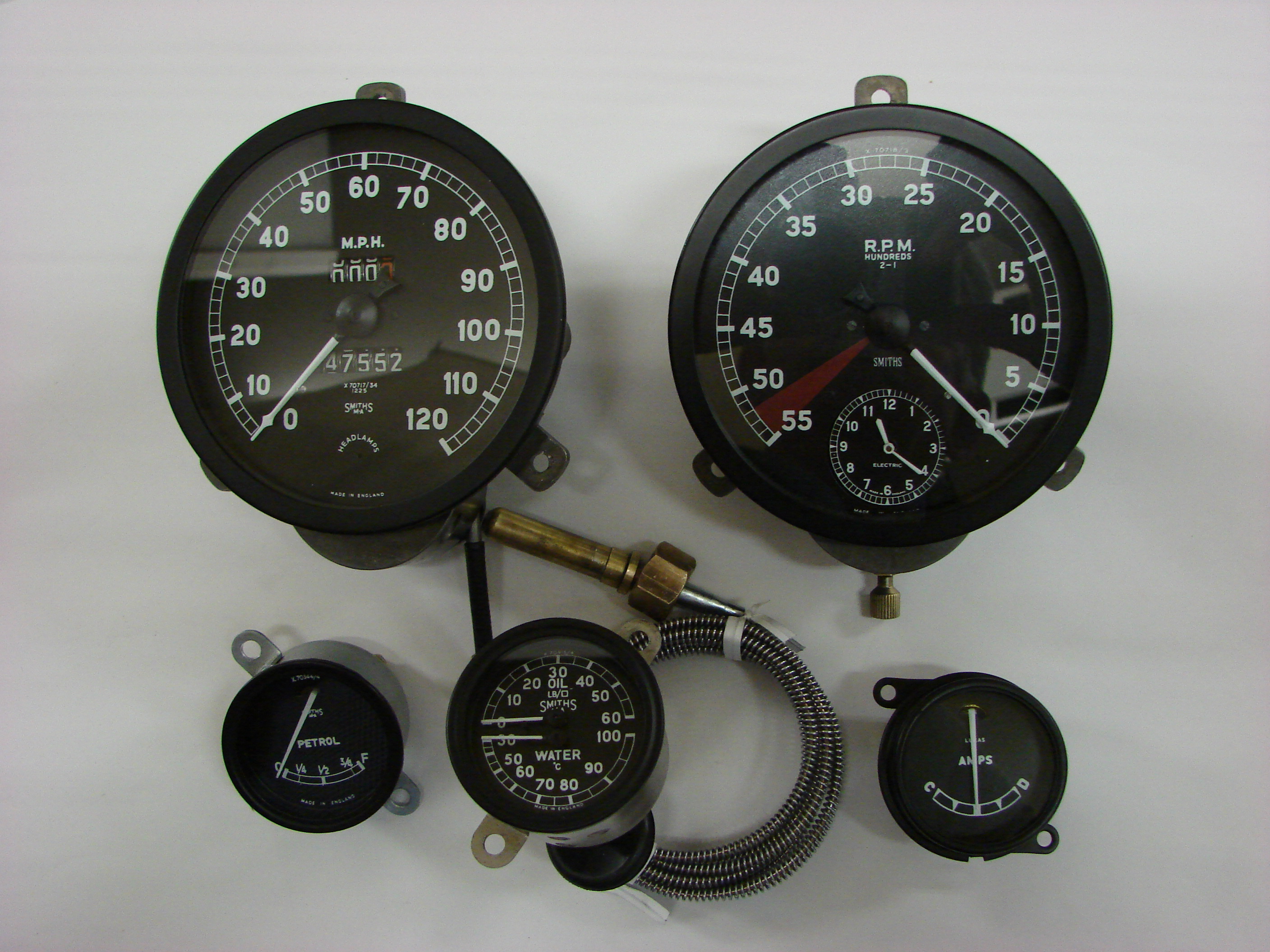 Black speedometers and other devices with wires